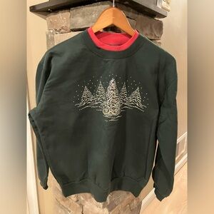 Woman’s Christmas sweatshirt with bead design